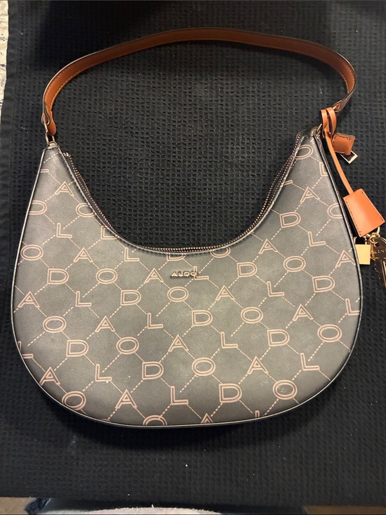 Aldo Handbags - Aldo Black Logo-Print Crescent Shoulder Bag with Tan Strap